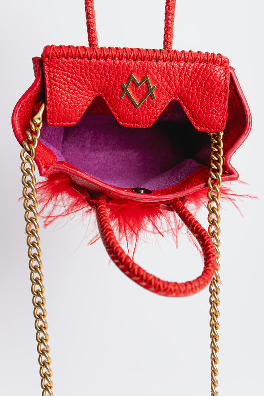 La Bebe in Red with feathers