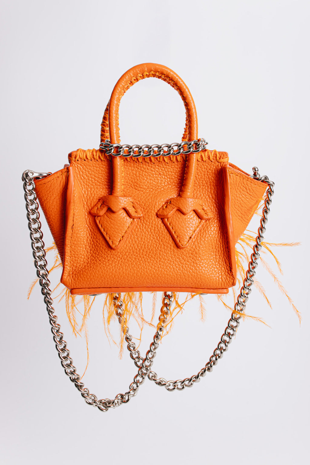La Bebe in Orange and Feathers