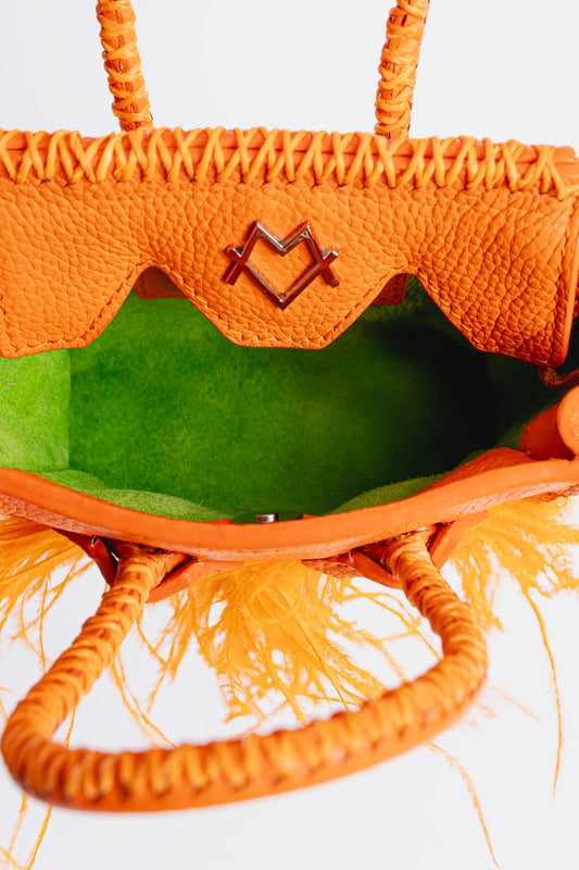 La Bebe in Orange and Feathers