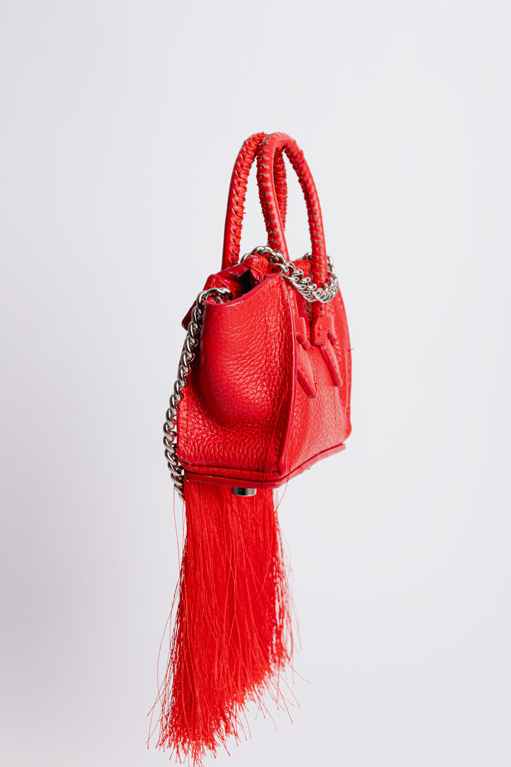 La bebe in red with tassels