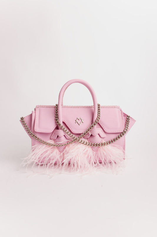 Fatima en rose bébé et plumes