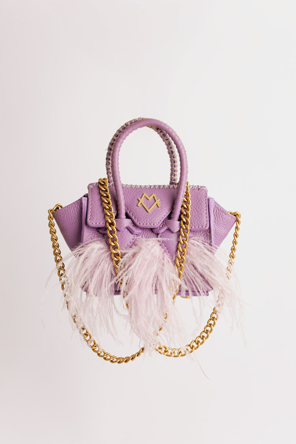 La Bebe lilas à plumes