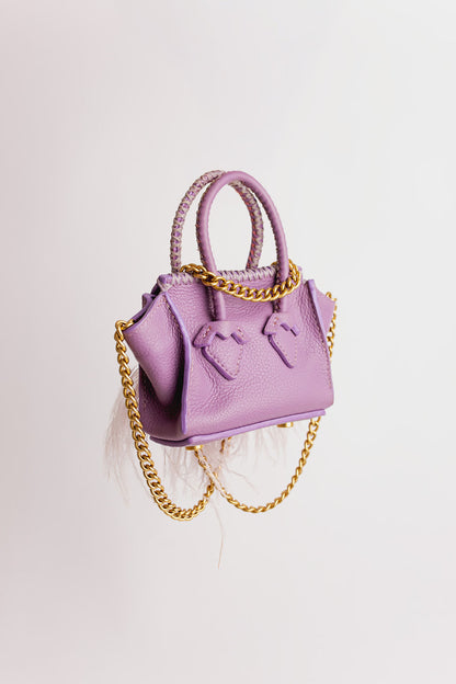 La Bebe lilas à plumes