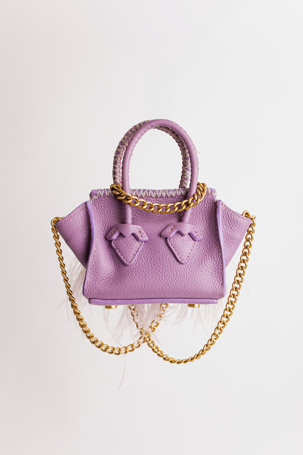 La Bebe lilas à plumes