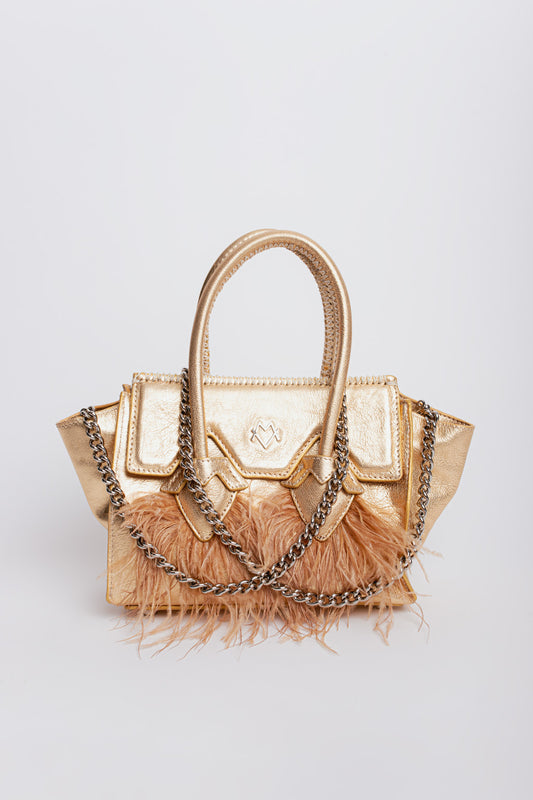 Valentina en or et plumes