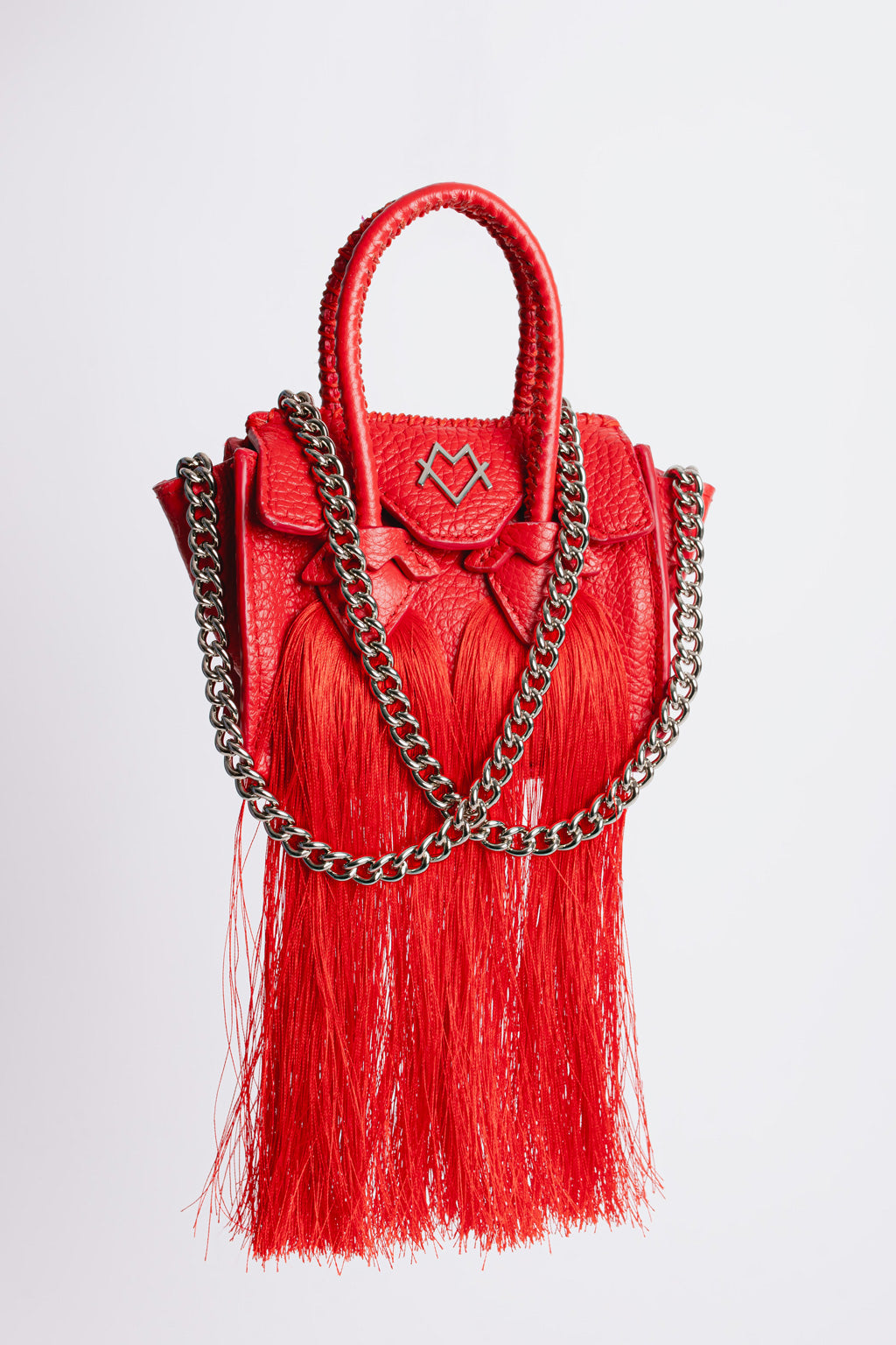 La bebe in red with tassels