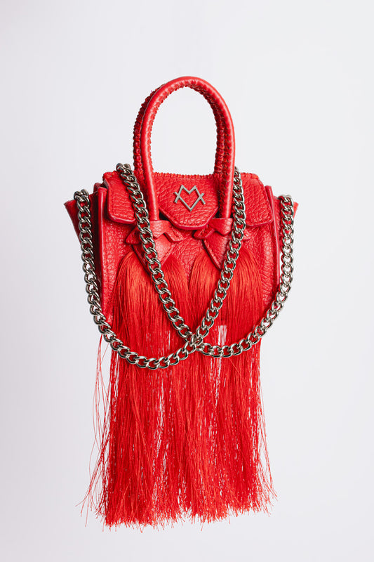La bebe in red with tassels
