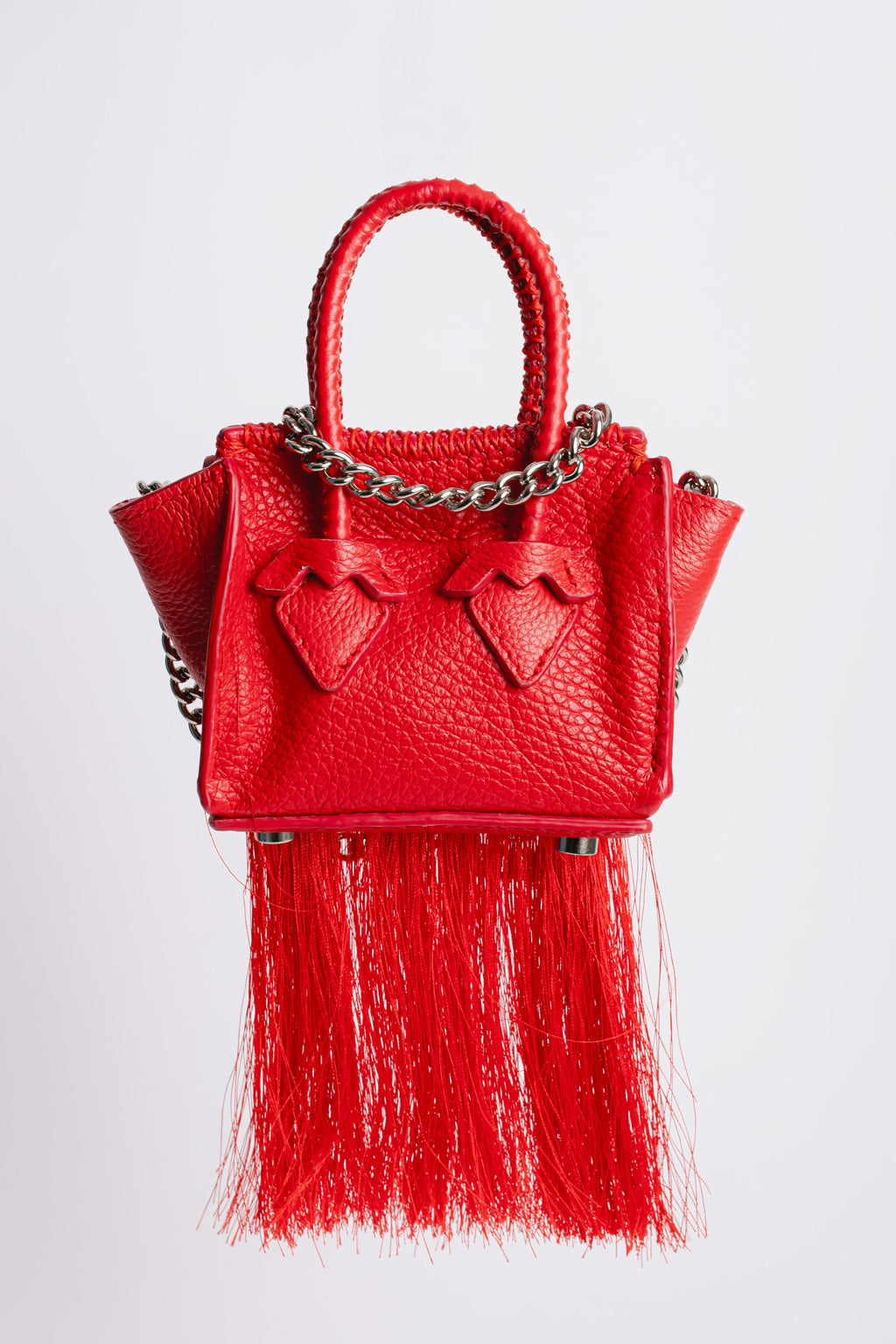 La bebe in red with tassels