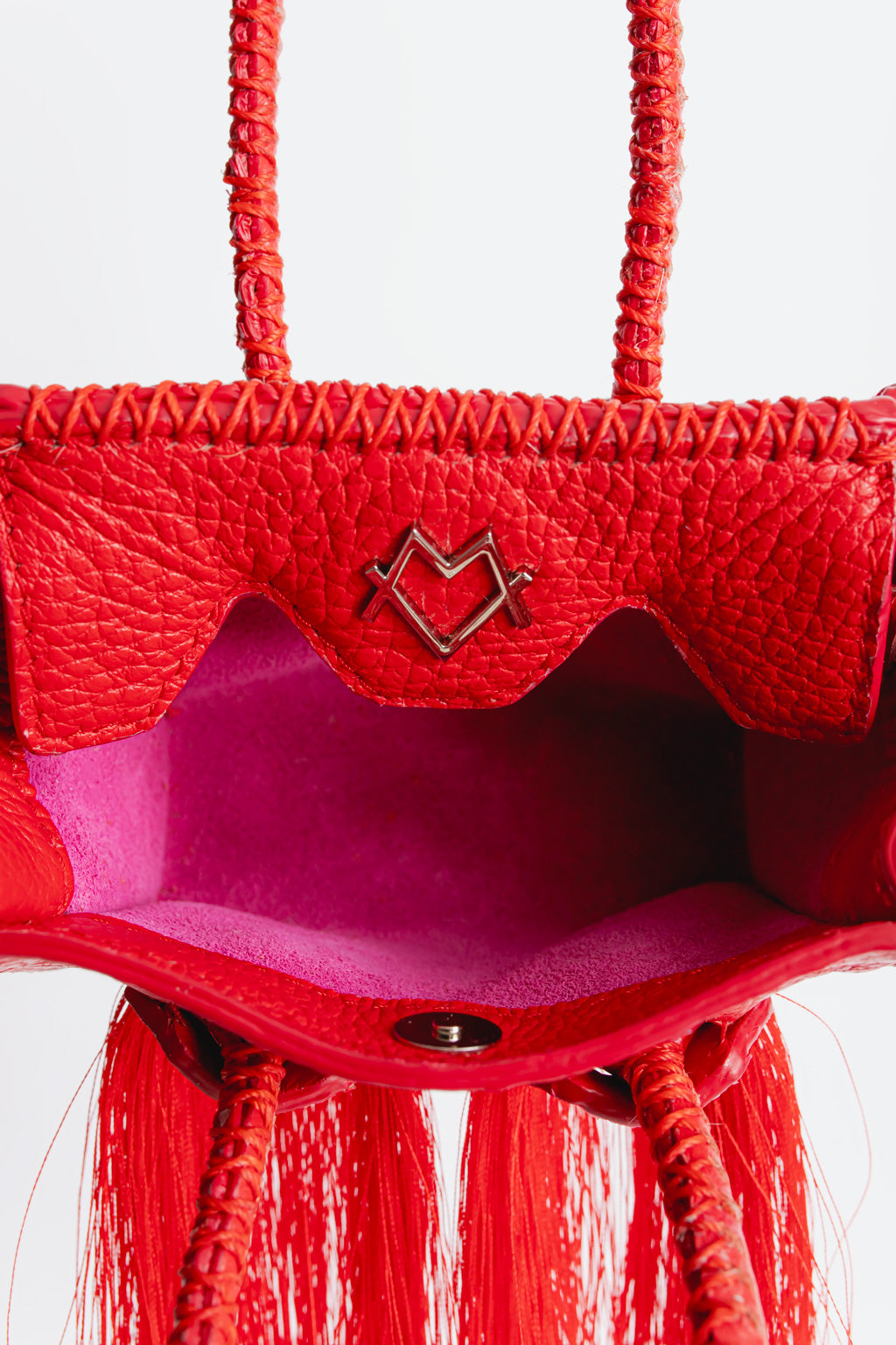 La bebe in red with tassels